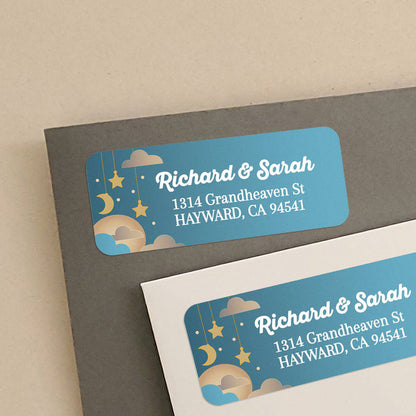 Personalized rectangular return address label with teal blue background, hanging golden stars, crescent moon, and clouds with bold white text - XOXOKristen