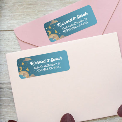 Close-up of personalized return address sticker with celestial night sky motif, golden stars, crescent moon, and playful typography - XOXOKristen