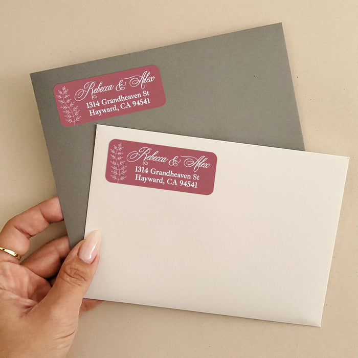 Personalized burgundy rectangular return address label with delicate white botanical sprig design and elegant cursive script typography - XOXOKristen