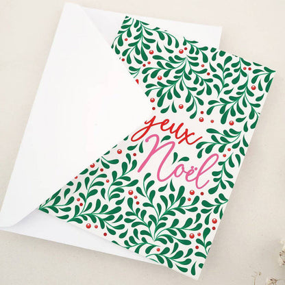 Joyeux Noël Christmas card with festive greenery and berries, styled with envelope – XOXOKristen