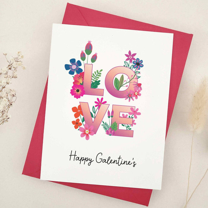 Happy Galentine’s Day card with floral LOVE letters, red envelope – XOXOKristen