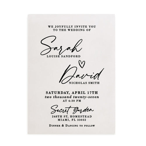 A personalized vellum wedding invitation card printed in rich matte black ink, featuring elegant modern calligraphy combined with clean serif typography. The translucent vellum surface gives a soft frosted appearance, allowing subtle light to pass through while keeping the text crisp and readable. The design layout includes the couple’s names in flowing cursive with a small heart between them and the wedding details below. Perfect for couples seeking minimalist luxury wedding stationery. – XOXOKristen
