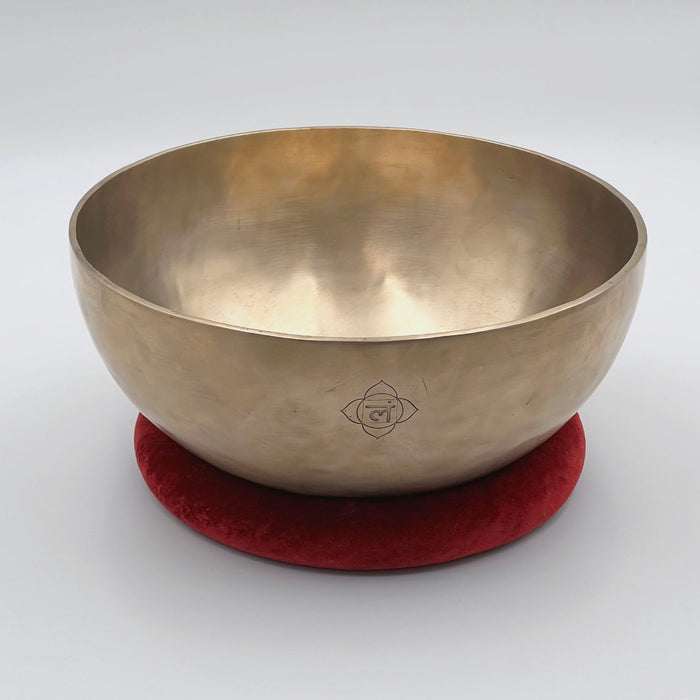 velvet ring cushion and root chakra bowl